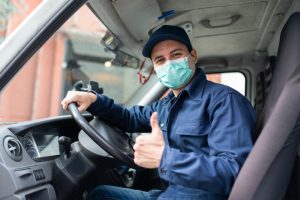 truck driver wearing ppe mask